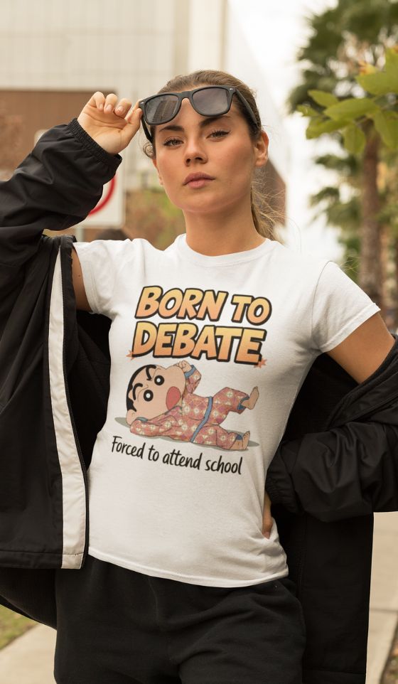 Woman wearing a white t-shirt with a cartoon character and the text "Born to Debate, Forced to attend school"