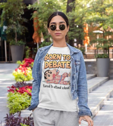 Woman wearing a white t-shirt with a cartoon character and the text "Born to Debate, Forced to attend school"