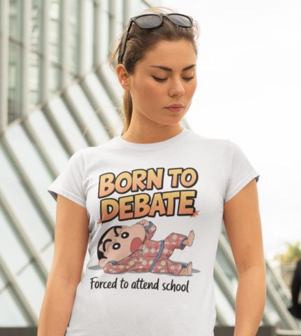 Woman wearing a white t-shirt with a cartoon character and the text "Born to Debate, Forced to attend school"