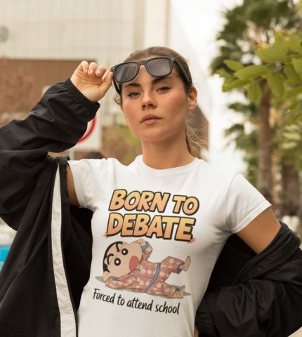 Woman wearing a white t-shirt with a cartoon character and the text "Born to Debate, Forced to attend school"